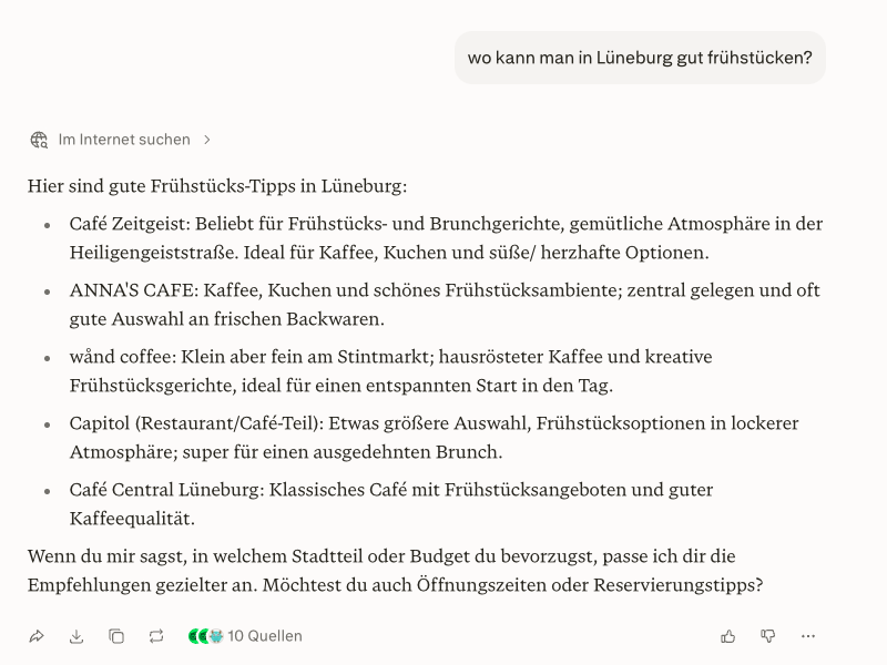 Perplexity beantwortet „wo kann man in Lüneburg gut frühstücken?“ und nennt konkret Cafés wie Café Zeitgeist, Anna's Café und wånd coffee.